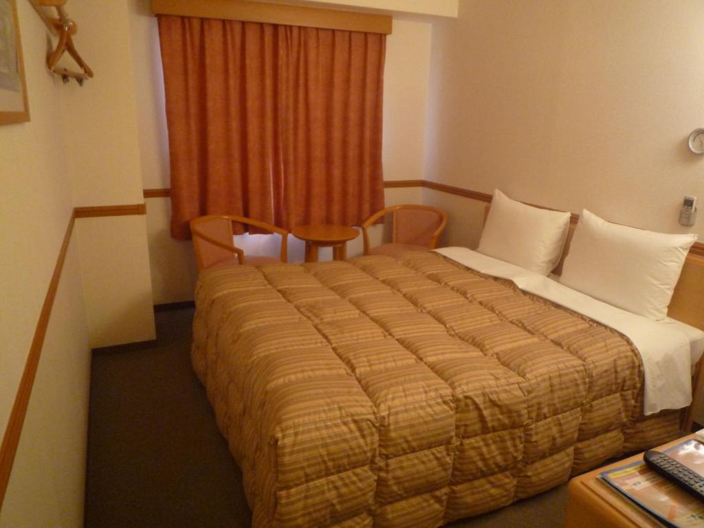 Toyoko Inn Hiroshima Heiwa-Odori Zimmer foto